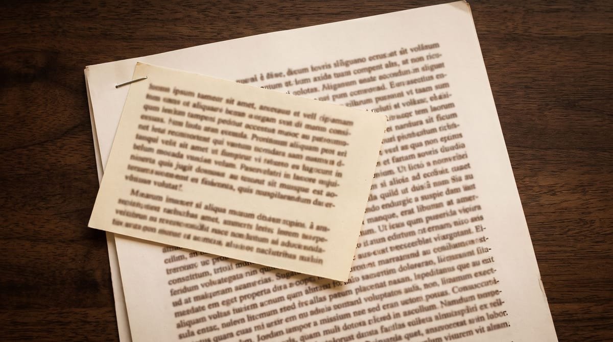 Kurdish (Kurmanji) translation visual: A revision slip stapled to the page it corrects.