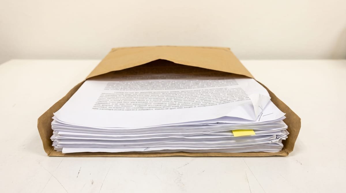 Somali translation visual: A wrapped bundle with its wrapper opened and folded back.