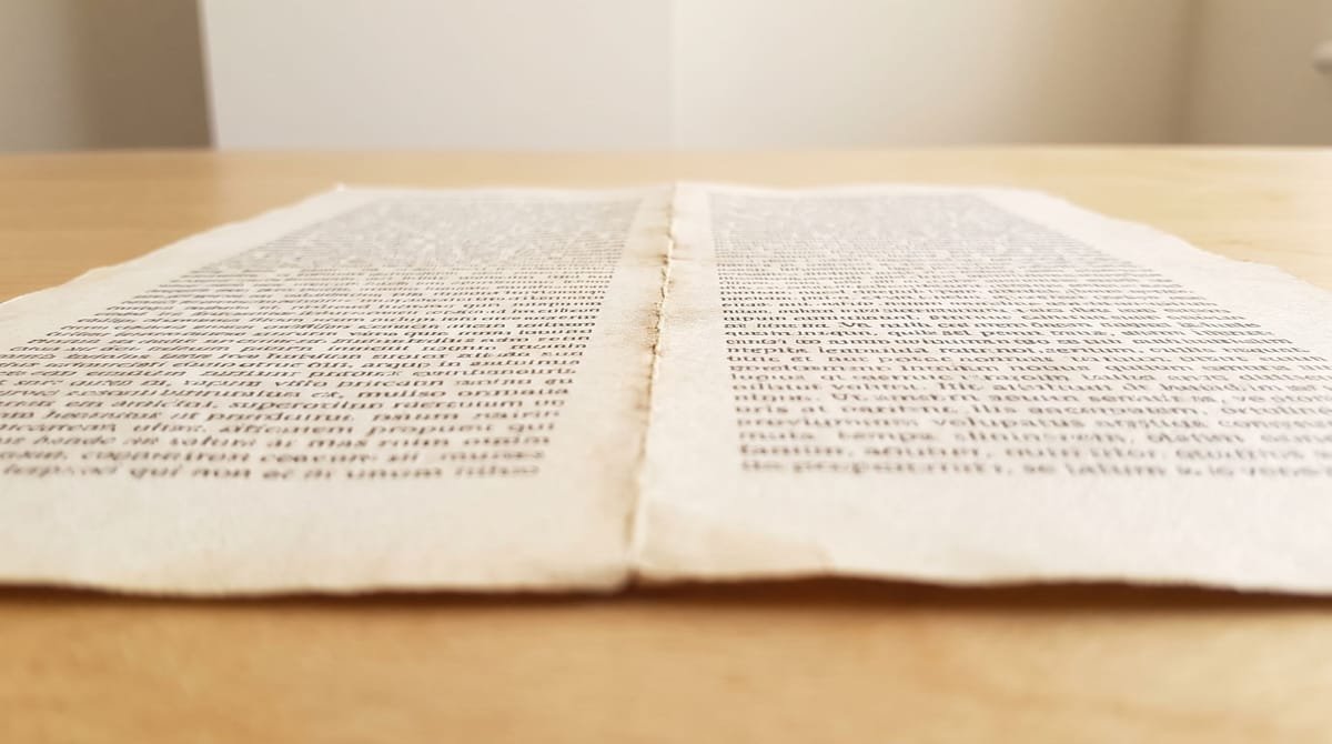 Swahili translation visual: A two-column word list with a fold pressed down its centre.